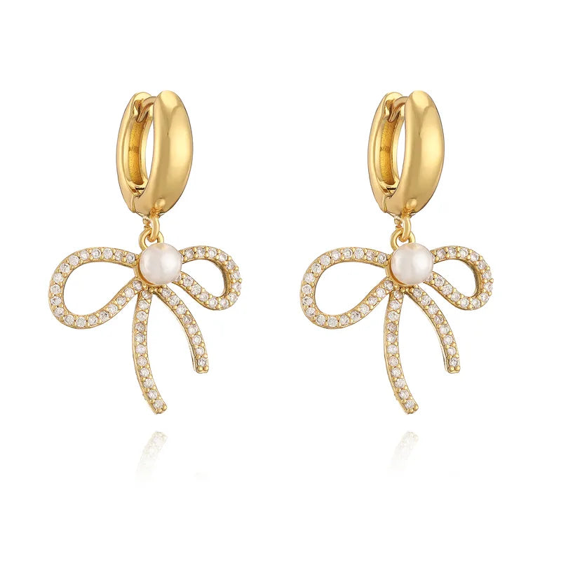 dorian bow knot huggies